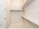 Spacious walk-in closet with built-in shelving and ample storage at 6657 S Kline Way, Littleton, CO 80127
