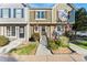 Charming townhome with colorful landscaping, a welcoming entrance, and a quaint American flag at 8140 S Fillmore Cir, Centennial, CO 80122
