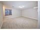 Basement room with carpet, natural light and neutral paint at 8034 Decatur St, Westminster, CO 80031