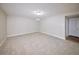 A simple room painted in neutral colors and featuring carpeted floors at 8034 Decatur St, Westminster, CO 80031