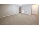 A large room featuring neutral carpet and paint, ready for personalization at 8034 Decatur St, Westminster, CO 80031