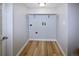 Bright utility room with wood-look flooring and plenty of space at 8034 Decatur St, Westminster, CO 80031