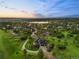 Aerial view of property featuring lush greenery and a long private driveway at 5602 Silver Bluff Ct, Parker, CO 80134