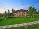 Beautiful home featuring a spacious porch and a sidewalk extending to the side of the property at 5602 Silver Bluff Ct, Parker, CO 80134