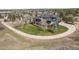 Aerial shot of a two-story home with a gray roof and ample yard space at 5602 Silver Bluff Ct, Parker, CO 80134