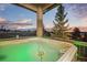 Relaxing hot tub setting with scenic views at sunset, perfect for unwinding at 5602 Silver Bluff Ct, Parker, CO 80134