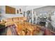 Open concept living space with a modern staircase and dining area at 5602 Silver Bluff Ct, Parker, CO 80134