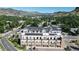 Commercial building with solar panels on the roof and mountain views in distance at 615 24Th St # 104, Golden, CO 80401