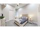 Bright bedroom features a queen bed, nightstands, and modern decor at 615 24Th St # 104, Golden, CO 80401