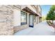 Commercial building features stone accents and awnings over the windows at 615 24Th St # 104, Golden, CO 80401