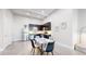 Eat-in kitchen featuring stainless steel appliances, dark blue cabinets, and plenty of storage space at 615 24Th St # 104, Golden, CO 80401