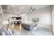 Open-concept living room with modern furniture, dining area, and kitchen featuring stainless steel appliances at 615 24Th St # 104, Golden, CO 80401