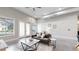 The spacious living room boasts an open floorplan, lots of natural light, and a modern gray couch at 615 24Th St # 104, Golden, CO 80401
