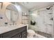 Modern bathroom featuring a glass-enclosed shower, contemporary vanity, and stylish fixtures at 12685 E Pacific Cir # B, Aurora, CO 80014
