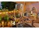 Enchanting backyard pond with stone accents, whimsical decor, and outdoor seating, ideal for serene relaxation and enjoyment at 16158 Whitestone Dr, Parker, CO 80134