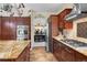 Beautiful kitchen with custom cabinets, stainless steel appliances, and a gas cooktop at 16158 Whitestone Dr, Parker, CO 80134