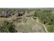 Picturesque view of a neighborhood with a winding pathway, lush greenery, and trees, great for walks and outdoor activities at 16158 Whitestone Dr, Parker, CO 80134