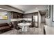 Well-designed kitchen featuring stainless steel appliances, dark cabinets, and modern finishes at 1643 Boulder St # 209, Denver, CO 80211