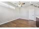 Open living room space with hardwood floors and natural light from window at 1299 Osceola St, Denver, CO 80204