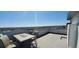 Relaxing rooftop deck with outdoor seating and panoramic city views, perfect for entertaining and enjoying the scenery at 1299 Osceola St, Denver, CO 80204