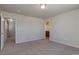 Spacious bedroom features neutral walls and plush carpeting at 814 N Bently St, Watkins, CO 80137