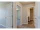 Hallway with neutral walls and plush carpeting at 814 N Bently St, Watkins, CO 80137