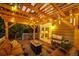 Back deck featuring a wooden pergola, string lights, and a grill, perfect for outdoor entertaining at 4307 Lily Gulch Trl, Castle Rock, CO 80109