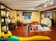 Finished basement with play area, painted walls, and ample room for activities at 4307 Lily Gulch Trl, Castle Rock, CO 80109