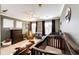 Bedroom featuring hardwood crib, dresser, neutral tones, and natural light at 4307 Lily Gulch Trl, Castle Rock, CO 80109