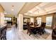 Elegant dining room with coffered ceilings, a chandelier, and stylish décor at 4307 Lily Gulch Trl, Castle Rock, CO 80109