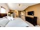 Main bedroom showcasing vaulted ceilings, natural light, and en suite bathroom at 4307 Lily Gulch Trl, Castle Rock, CO 80109
