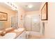 Well-lit bathroom featuring double sinks and a shower and tub combination at 3259 W 111Th Drive, Westminster, CO 80031
