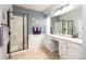 Clean bathroom with a large shower, soaking tub, and double sinks at 3259 W 111Th Drive, Westminster, CO 80031