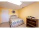 Well-lit bedroom features carpet floors, a comfortable bed, bedside tables, and a closet for clothing storage at 3259 W 111Th Drive, Westminster, CO 80031