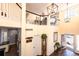 Grand entryway with high ceilings, staircase, and natural light pouring in from large windows at 3259 W 111Th Drive, Westminster, CO 80031