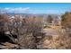 Scenic view showcasing neighborhood homes with snow-capped mountains in the distance, adding natural beauty to the landscape at 3259 W 111Th Drive, Westminster, CO 80031