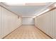 Spacious basement with tile floors and paneled walls offers versatile space at 5070 W 66Th Ave, Arvada, CO 80003