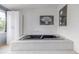 Relaxing soaker tub with carpeted surround and framed wall art at 5070 W 66Th Ave, Arvada, CO 80003