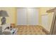 Spacious room featuring two large closets, tile floor, and ample storage space at 5070 W 66Th Ave, Arvada, CO 80003