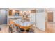 Bright kitchen with a center island, stainless steel appliances, and modern countertops at 5070 W 66Th Ave, Arvada, CO 80003