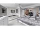 Spacious main bedroom featuring an ensuite with raised tub and ceiling fan at 5070 W 66Th Ave, Arvada, CO 80003