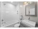 Clean bathroom, featuring a bathtub and modern vanity at 2257 S High St, Denver, CO 80210