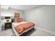 Cozy basement bedroom with carpeted floor and window at 2257 S High St, Denver, CO 80210