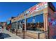 Brick commercial building with windows and signage at 2257 S High St, Denver, CO 80210