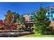 Modern footbridge with glass panels and school logo at 2257 S High St, Denver, CO 80210