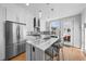 Modern kitchen with stainless steel appliances and a large island at 2257 S High St, Denver, CO 80210