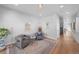 Spacious living room with hardwood floors and comfortable seating at 2257 S High St, Denver, CO 80210