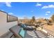 Relaxing rooftop deck with lounge chairs and city views at 2257 S High St, Denver, CO 80210