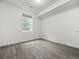 Finished basement with window view and neutral carpeting creating the perfect additional living space at 3715 Kalamath St, Denver, CO 80211