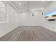 Finished basement featuring neutral carpeting, recessed lighting and a flat screen television for seamless entertaining at 3715 Kalamath St, Denver, CO 80211